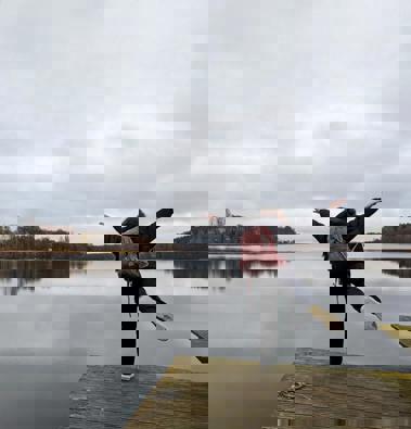 Nicole standing next to a lake